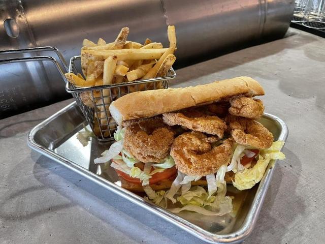 A shrimp po'boy from Adopted Dog Brewing. Photo 3
