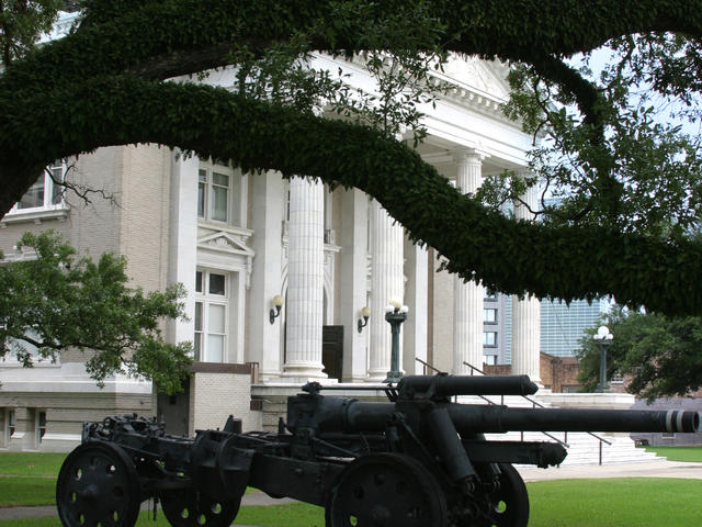 Cannon outside the old courthouse in Lake Charles' Charpentier Historic District. Photo 3