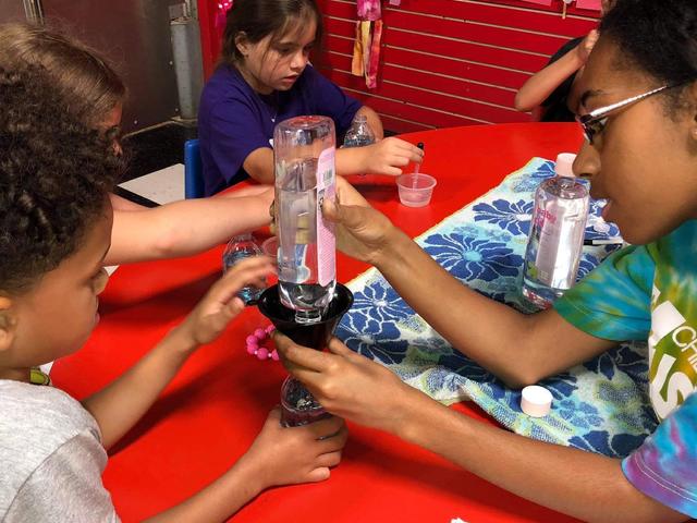 Kids enjoy STEAM activities during a Daily Discoveries Program.