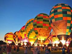Red River Balloon Rally glow at night.