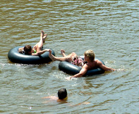 People enjoy tubing in Bogue Chitto State Park.